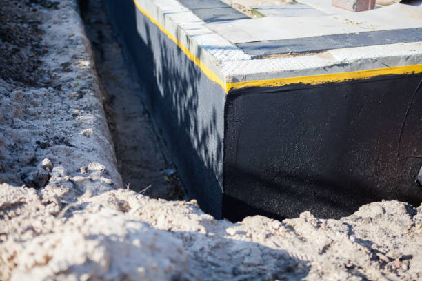 Professional Basement Waterproofing technician working in Stanwood, WA